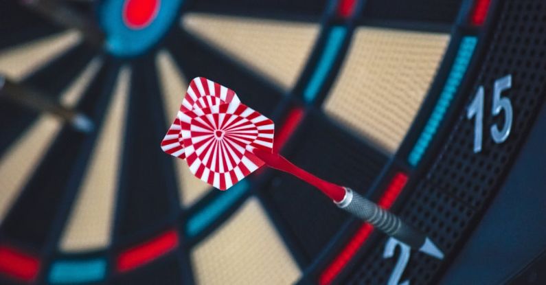 Strategy - Red and White Dart on Darts Board