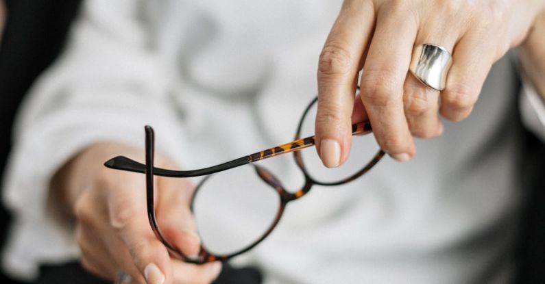 Practices - Person Holding Brown Framed Eyeglasses