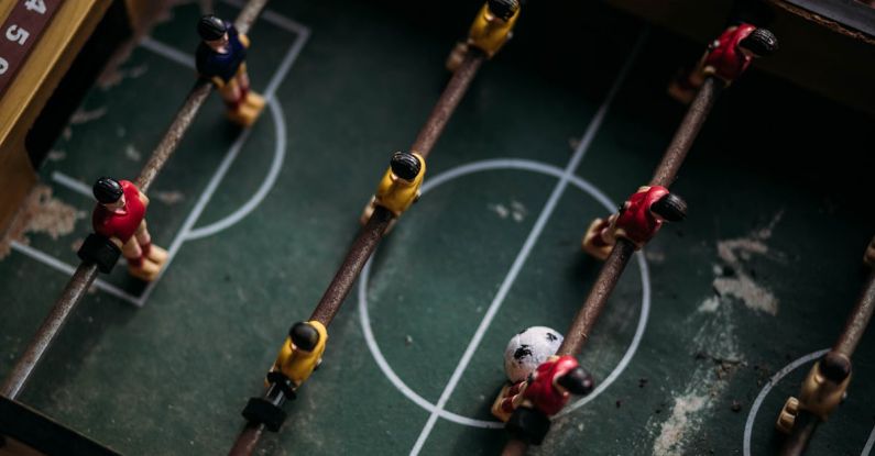 Competence - Close-up and Top Photography of Football Table